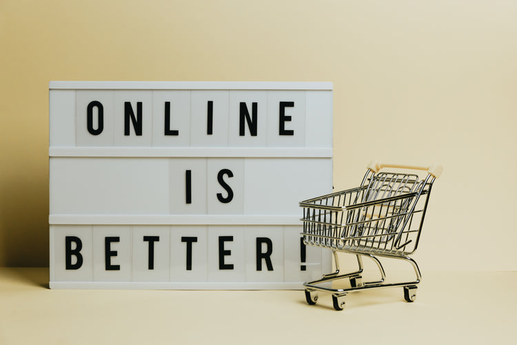 sign-says-online-is-better-with-a-small-shopping-cart - Rebelleve